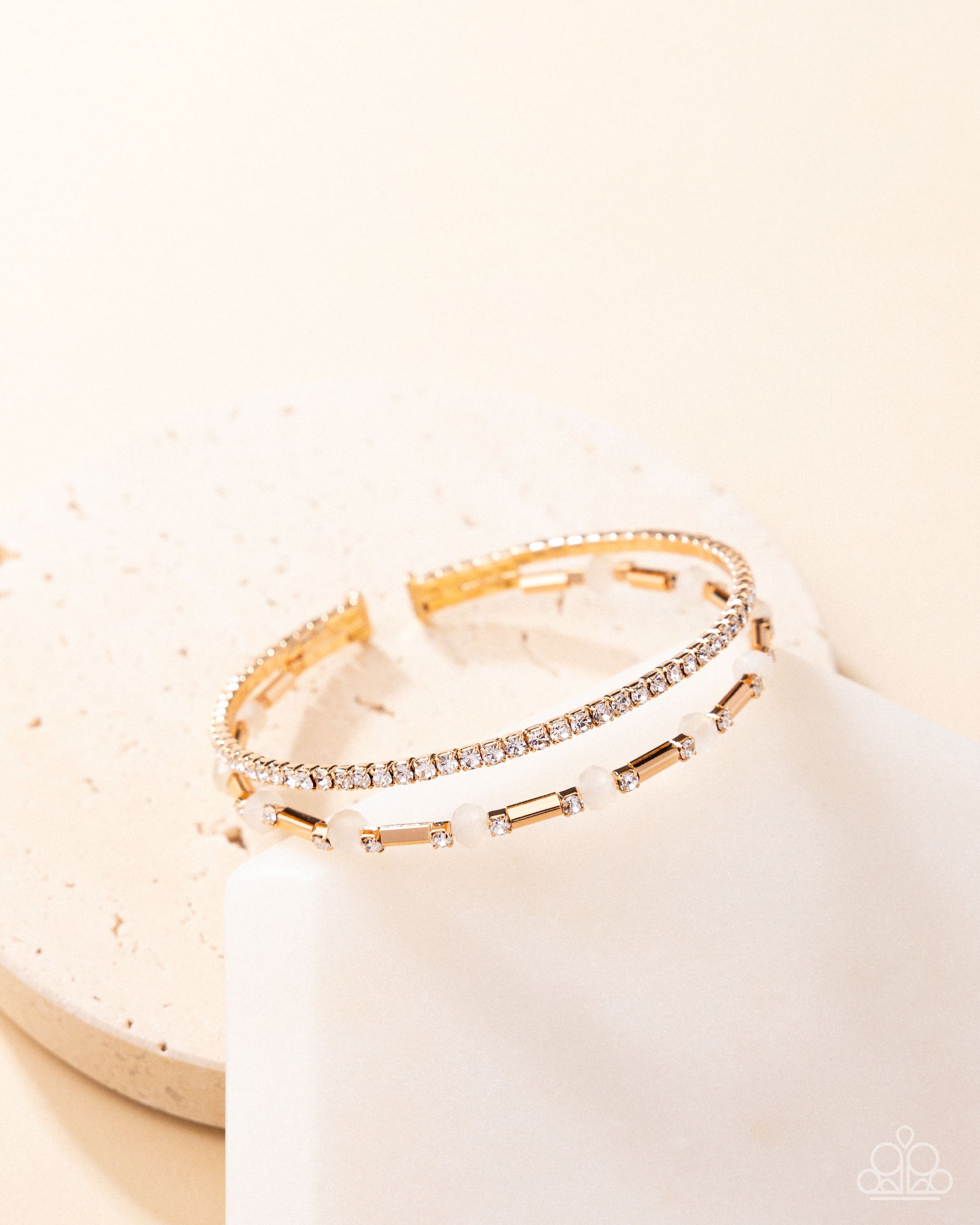 Publicity Pizzazz - Gold - Paparazzi Bracelet Image