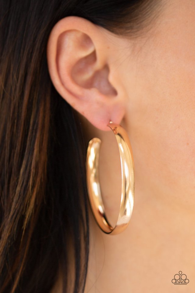 A Double Feature - Gold - Paparazzi Earring Image