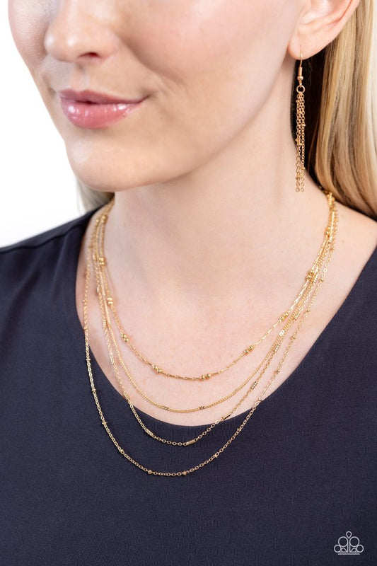Studded Shimmer - Gold - Paparazzi Necklace Image