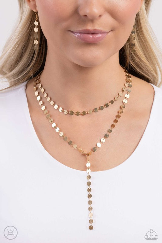 Reeling in Radiance - Gold - Paparazzi Necklace Image