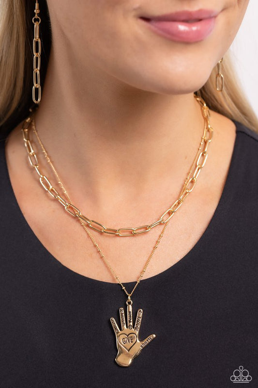 Giving a Hand - Gold - Paparazzi Necklace Image