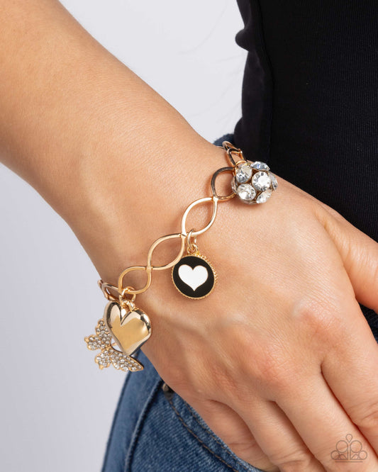 Lullaby Lucky - Gold - Paparazzi Bracelet Image