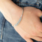 Twinkling Twist - White - Paparazzi Bracelet Image